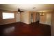 Living room with hardwood floors, showing access to other rooms at 1829 Bough Ave # 4, Clearwater, FL 33760