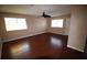 Spacious living room with hardwood floors and neutral walls at 1829 Bough Ave # 4, Clearwater, FL 33760