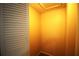 Small closet with louvered doors and lighting at 1829 Bough Ave # 4, Clearwater, FL 33760