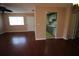 Open living room with view of kitchen and hardwood floors at 1829 Bough Ave # 4, Clearwater, FL 33760
