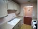 Well-equipped kitchen with view into dining area at 1829 Bough Ave # 4, Clearwater, FL 33760