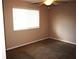 Spacious bedroom with ceiling fan and neutral walls at 1829 Bough Ave # 4, Clearwater, FL 33760