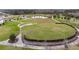 Large community park with walking paths and a pond at 21811 Lyonia Ln, Land O Lakes, FL 34637