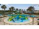 Community water playground with slides and interactive features at 21811 Lyonia Ln, Land O Lakes, FL 34637