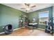 Home office with a view and stylish cat tree at 21811 Lyonia Ln, Land O Lakes, FL 34637