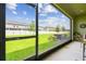 Screened patio overlooking a spacious backyard at 21811 Lyonia Ln, Land O Lakes, FL 34637