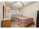 Bedroom with double bed and wood dresser at 7313 S Obrien St, Tampa, FL 33616