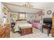Bedroom with double bed, twin bed, and wood dresser at 7313 S Obrien St, Tampa, FL 33616