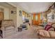 Living room with couch and chair, vintage decor at 7313 S Obrien St, Tampa, FL 33616