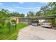 House exterior with carport and landscaping at 7313 S Obrien St, Tampa, FL 33616