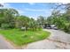 House exterior with driveway and landscaping at 7313 S Obrien St, Tampa, FL 33616