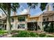 Lovely two-story building with lake view and lush greenery at 2824 Countryside Blvd # 313, Clearwater, FL 33761