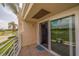 Balcony with sliding glass doors and a view of the golf course at 6141 Bahia Del Mar Blvd # 232, St Petersburg, FL 33715