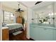 Bedroom with wooden floors and ceiling fan at 6141 Bahia Del Mar Blvd # 232, St Petersburg, FL 33715
