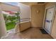 Small entryway or balcony with a door and view of a courtyard at 6141 Bahia Del Mar Blvd # 232, St Petersburg, FL 33715