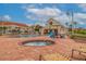 Community pool with hot tub, lounge chairs, and surrounding buildings at 6141 Bahia Del Mar Blvd # 232, St Petersburg, FL 33715