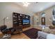Living area with hardwood floors, comfortable seating and built-in shelving at 3623 Doral St, Palm Harbor, FL 34685