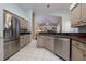Kitchen with stainless steel appliances and granite countertops at 3623 Doral St, Palm Harbor, FL 34685
