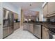 Kitchen features stainless steel appliances and granite countertops at 3623 Doral St, Palm Harbor, FL 34685