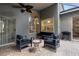 Outdoor patio with seating area, grill, and view of the house at 3623 Doral St, Palm Harbor, FL 34685