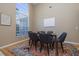 Dining area with hardwood floors and large window at 3623 Doral St, Palm Harbor, FL 34685