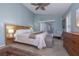 Bright main bedroom with king bed and private access to patio at 3623 Doral St, Palm Harbor, FL 34685