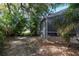 Screened patio, lush landscaping at 3623 Doral St, Palm Harbor, FL 34685