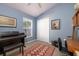 Bright bedroom with a piano, home office, and built in closet at 3623 Doral St, Palm Harbor, FL 34685