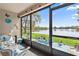 Relaxing screened porch overlooking a tranquil lake at 750 N Village N Dr # 106, St Petersburg, FL 33716