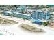 Aerial view of beachfront hotel with pool and beach access at 10650 Gulf Blvd # 340, Treasure Island, FL 33706