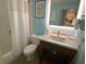 Condo bathroom with shower, toilet and vanity at 10650 Gulf Blvd # 340, Treasure Island, FL 33706