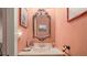 Powder room with a vanity and decorative mirror at 2700 Bayshore Blvd # 2C/578, Dunedin, FL 34698