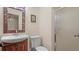 Bathroom with a shower, toilet, and a wood vanity at 2700 Bayshore Blvd # 2C/578, Dunedin, FL 34698