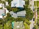 An aerial view of a charming neighborhood with tree-lined streets and well-maintained homes at 106 19Th Ave, St Pete Beach, FL 33706