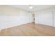 Bright bedroom features hardwood floors, white trim and two closets at 106 19Th Ave, St Pete Beach, FL 33706