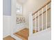Charming stairway nook with built-in seating and natural light at 106 19Th Ave, St Pete Beach, FL 33706