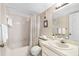 Clean bathroom with shower/tub combo, vanity, and updated fixtures at 5775 Park N St # 411, St Petersburg, FL 33709