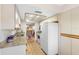 Kitchen with granite counters and white appliances at 5775 Park N St # 411, St Petersburg, FL 33709