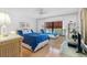 Comfortable bedroom with a queen-size bed and mirrored closet at 5775 Park N St # 411, St Petersburg, FL 33709