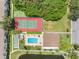 Community tennis court, shuffleboard, and pool area at 5775 Park N St # 411, St Petersburg, FL 33709