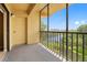 Private balcony overlooking the lake and lush greenery at 5775 Park N St # 411, St Petersburg, FL 33709