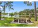 Relaxing patio seating area overlooking a lake at 5775 Park N St # 411, St Petersburg, FL 33709