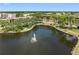 Aerial view of community with lake and fountain at 5775 Park N St # 411, St Petersburg, FL 33709