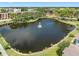 Aerial view of community with lake and fountain at 5775 Park N St # 411, St Petersburg, FL 33709