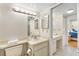 Bathroom with a toilet, sink, and vanity at 5775 Park N St # 411, St Petersburg, FL 33709
