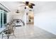 Bedroom with kitchen passthrough and ceiling fan at 2570 Gary Cir # 3, Dunedin, FL 34698