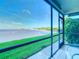 Enjoy waterfront views from this screened balcony at 2570 Gary Cir # 3, Dunedin, FL 34698