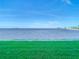 Scenic waterfront view with lush green grass at 2570 Gary Cir # 3, Dunedin, FL 34698