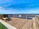 Relaxing wooden deck overlooking the water at 2570 Gary Cir # 3, Dunedin, FL 34698