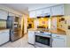 Modern kitchen with stainless steel appliances and wood countertops at 2014 Montego Ct, Oldsmar, FL 34677